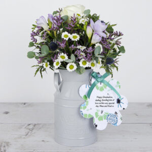 Dutch Roses, Purple Freesias, Blue Eryngiums and Lilac Limonium with Eucalyptus in our Keepsake Flowerchurns